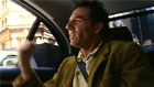 Kramer in back of car